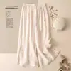 Calça pantalona de algodão e linho bordada estilo chinês para mulheres, com fenda na barra, design vintage e artístico, e corte solto e casual. Nova coleção de verão 2025