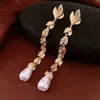 Pendientes de Reloj de Bolsillo Asimétricos con Incrustaciones de Perla de Aguja Plateada y Diamante Pendientes de Botón Exquisitos Retro Franceses con Sentido de Diseño Pendientes de Nicho Venta al por Mayor
