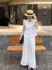 Conjunto de Duas Peças Feminino de Moda de Luxo com Colete Vazado e Calça de Perna Larga, Roupa Emagrecedora e Rejuvenescedora, Novo Estilo Tendência Verão 2026