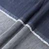 Tejido vaquero 21 hilos nylon-algodón 200g sarga de caballería denim, material moderno y versátil para pantalones, chaquetas y vestidos