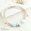 Pulseira de cerâmica Xiaohongshu transfronteiriça, cordão trançado ajustável feito à mão, design único, acessório personalizado e artístico, atacado