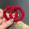Goma de pelo de flannel coreano con forma de intestino de cerdo, tejido de alta elasticidad, cuerda gruesa para el pelo, tienda, sección de tocados transfronterizos, venta al por mayor de grandes almacenes