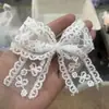 Nuo Ru Encaje Perla Doble Cinta Lazo Hecho a Mano Accesorios Zapatos Calcetines Bolsas Accesorios de Ropa Accesorios al por Mayor
