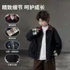 Chaqueta de mezclilla para niños, estilo primavera, top de cuello camisero, nuevo modelo 2026, elegante versión coreana para niños mayores, chaqueta de marca moderna para niños