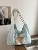 Bolso de lona casual súper popular estilo coreano para mujer, nuevo modelo 2026, relajado, gran capacidad, para el día a día, de hombro y para llevar debajo del brazo