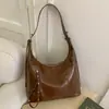 Nova Coleção Outono/Inverno 2025 Estilo Acessível Luxo Nicho High-End Bolsa Transversal Feminina Compartimento Único Versátil Grande Capacidade Bolsa de Ombro