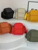 Mochila pequeña casual transfronteriza 2025 nueva popular ligera bolsa para teléfono móvil nailon hombro bandolera comercio exterior