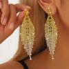 Pendientes de temperamento con diseño de personalidad de estilo lujoso y ligero de alta gama con borlas de diamantes de imitación de nueva tendencia transfronteriza entre Europa y Estados Unidos al por mayor