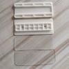 Venta al por mayor de fábrica soporte de enchufe sin perforaciones montado en la pared sin costuras para el hogar, fuerte pasta, soporte para enchufe de toma