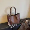 2026 nova bolsa de ombro transversal tote balde feminina de grande capacidade para o dia a dia, transfronteiriça, moderna, simples e elegante