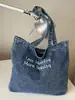 Bolsa de Mezclilla Casual de Gran Capacidad Shuai Mijia para Mujer 2026 Nuevo Bolso de Hombro para el Trabajo Ligero Bolso Tote para Estudiante Universitario