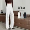 Pantalones blancos de pierna ancha para mujer, estilo fino de otoño, nuevo modelo 2026, con una sensación de caída de alta gama, pantalones deportivos casuales de pierna recta