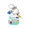 Llaveros personalizados más vendidos transfronterizos, dijes para mochilas, colgantes de aleación para la temporada de graduación, accesorios con temática de campus para las mochilas de los estudiantes