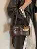 Bolsa de Ombro Feminina Vintage Transfronteiriça de Nicho Moda 2026 Novo Modelo Fresca e Simples Bolsa de Ombro para o Dia a Dia Bolsa de Braço