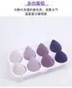 Huevo de maquillaje transfronterizo súper suave de moda Artículos de celebridades de internet maquillaje huevo de belleza de 8 rejillas gota de agua corte oblicuo puff traje
