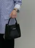 Bolso Cubo Texturizado Estilo Coreano Principios de Otoño para Mujer 2025 Nuevo Popular Bolso de Mano Elegante Estilo Extranjero Versátil para Viajar y Uso Diario Bolso Cruzado