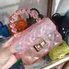 2026 Nova Versão Coreana Bolsa Pequena Chique com Padrão de Diamante Transparente Bolsa de Gelatina Versátil com Corrente Mini Bolsa de Ombro Transversal