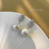 Pendientes de perlas de circonita explosivas transfronterizas, pendientes de lujo ligeros franceses de alta gama, pendientes de diseño de nicho simple de moda