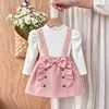 Conjunto de dos piezas para bebé niña, top liso de manga abullonada con cuello redondo + falda con tirantes desmontables, transfronterizo europeo y americano, 2026