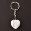 Llavero con colgante de corazón transfronterizo de 30*12 mm, corazón de cristal rosa de piedra natural, accesorio popular para DIY
