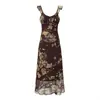 26307 Vestido retro francés para la temporada de té de primavera 2026 con un temperamento suave, cuello en V, estampado floral y tirantes finos, adecuado para vacaciones en la playa