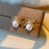 Nuevos Pendientes Dulces de Lazo y Perla para Primavera y Verano para Mujer, Pendientes de Diseño Nicho, Pendientes de Imitación de Nácar de Lujo Ligero al por Mayor