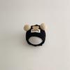 Gorro de bebé bonito de otoño e invierno, estilo coreano, cálido, resistente al frío, con protección para los oídos, suave, con doble bola, de cera suave, de oso Baotou.