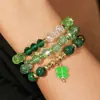 Europa y América. Pulsera Verde del Día de San Patricio Apilada con Cuentas de Arcilla Suave, Decoración de Colgante Hecho a Mano de Trébol de Cuatro Hojas de Buena Suerte