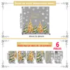 Vários adesivos coloridos de Natal com tema natalino para janelas, com desenhos de árvores de Natal e flocos de neve, para decorar vitrines de lojas e portas de vidro.; adesivos de janela eletrostáticos