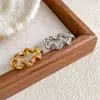 Anillo de Moda Estilo Coreano con Circonita Incrustada para Niñas con Temperamento Irregular y Diseño Retorcido Anillo Accesorios Transfronterizos y Accesorios de Mano