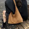 Bolsa feminina grande de couro fosco retrô, nova bolsa de ombro única para mãe e filha outono/inverno 2026, bolsa tote texturizada para trabalho e deslocamento
