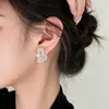 Pendientes de Flor Recortada con Perlas Estilo Retro Francés para Mujer 2026 Nuevo Estilo Lujo Accesible Francés Pendientes Versátiles Exquisitos de Alta Gama