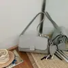 Bolsas Pequenas Tendência Transfronteiriças para Mulheres Verão 2026 Nova Moda Bolsa Transversal de Cor Sólida para Mulheres Bolsa de Ombro de Alta Qualidade para o Dia a Dia
