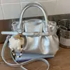 Bolso de Mano Plateado Transfronterizo para Mujer, Bolso Tote Pequeño, Nuevo Modelo 2026, Textura de Alta Calidad, Bolso Tote Cruzado Plegado de Nicho