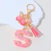 Llavero Rosa Pegamento Nieve Lentejuela Letra con Borla de Mariposa Colgante para Bolsa de Niñas Regalo de Fiesta