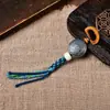 Accesorios pequeños colgantes de lado estilo Tíbet, hechos a mano con hueso de vaca y ágata roja del sur, con borlas, adornos decorativos y colgantes