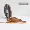 Lazo de regalo de color sólido de 1 cm flor decorativa para envolver material para ramos de cinta de satén venta al por mayor