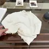 Ropa para Niñas de Primavera y Otoño Camiseta Bebé Elegante Personalidad Infantil Marca de Moda Estilo Coreano Cuello de Encaje Borde con Volantes Color Sólido Camiseta Base