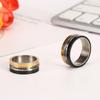 Anillo con personalidad para amantes de los tres colores giratorios de acero de titanio europeo y americano, chapado al vacío, anillo colgante con números romanos y hora transfronteriza.