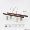 Percha para pantalones de madera maciza en color nogal negro, especialmente para tiendas de ropa, para uso doméstico y de hotel, sin marcas, antideslizante, percha con pinza de madera para pantalones al por mayor