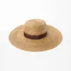 Moda Casual Nueva Primavera y Verano Europea y Americana Sombrero de Paja de Ala Ancha de Copa Plana con Cinta de Hoja de Palma Tejida a Mano Protección Solar Sombrilla Tendencia