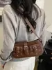 Bolso de hombro retro de alta gama para chica popular transfronterizo, bolso de hombro de moda estilo motociclista, bolso cruzado versátil para el día a día