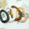 Venta al por mayor del fabricante en stock de hebillas de resina ovaladas con forma de gota de agua para cinturón, hebillas para chaquetas de cuero, hebillas de dos posiciones, hebillas de conexión para trajes de baño, hebillas decorativas