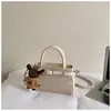 Bolso de mano de alta gama estilo coreano esmerilado para mujer, nuevo modelo 2025, estilo callejero simple retro, bolso de hombro y bandolera para el trabajo
