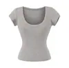 Atacado Exportação Transfronteiriça Roupas Femininas Verão 2025 Estilo Europeu e Americano Gola U Manga Curta Ombro Direito Cor Lisa Camisetas Tops para Mulheres Z625255