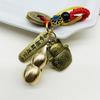 Nuevo colgante de calabaza de cobre retro doble palillos giratorio dinero llavero tejido a mano cinco emperadores dinero colgante coche llavero colgante