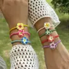Nuevo Pulsera de Plumeria Estilo Bohemio de Resort Transfronterizo Europeo y Americano Versátil Flor de Arcilla Suave Pulsera de Cuentas de Arroz para Mujer