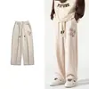 Calça de Moletom Esportiva Tricotada Masculina Estilo Americano Retrô com Perna Larga Harem Outono Calças Casuais Masculinas com Letra