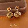 Pendientes de botón redondos de circonita cúbica y ojo de tigre vintage usados diseño de nicho pendientes retro para mujer