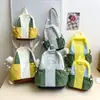 Mochila de Nylon Color de Contraste Estilo Universitario Casual para Estudiantes Mujeres 2025 Nueva Moda Pequeña para Viajes y Salidas